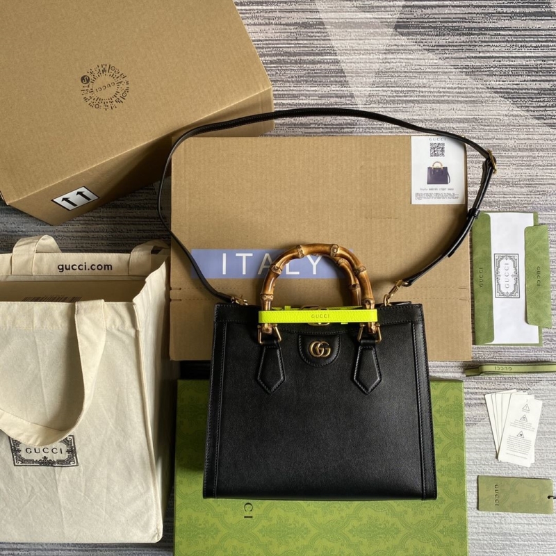 G*u*i top handle bags